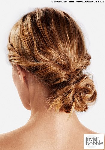 Gezwirbelter Chignon im Messy-Look