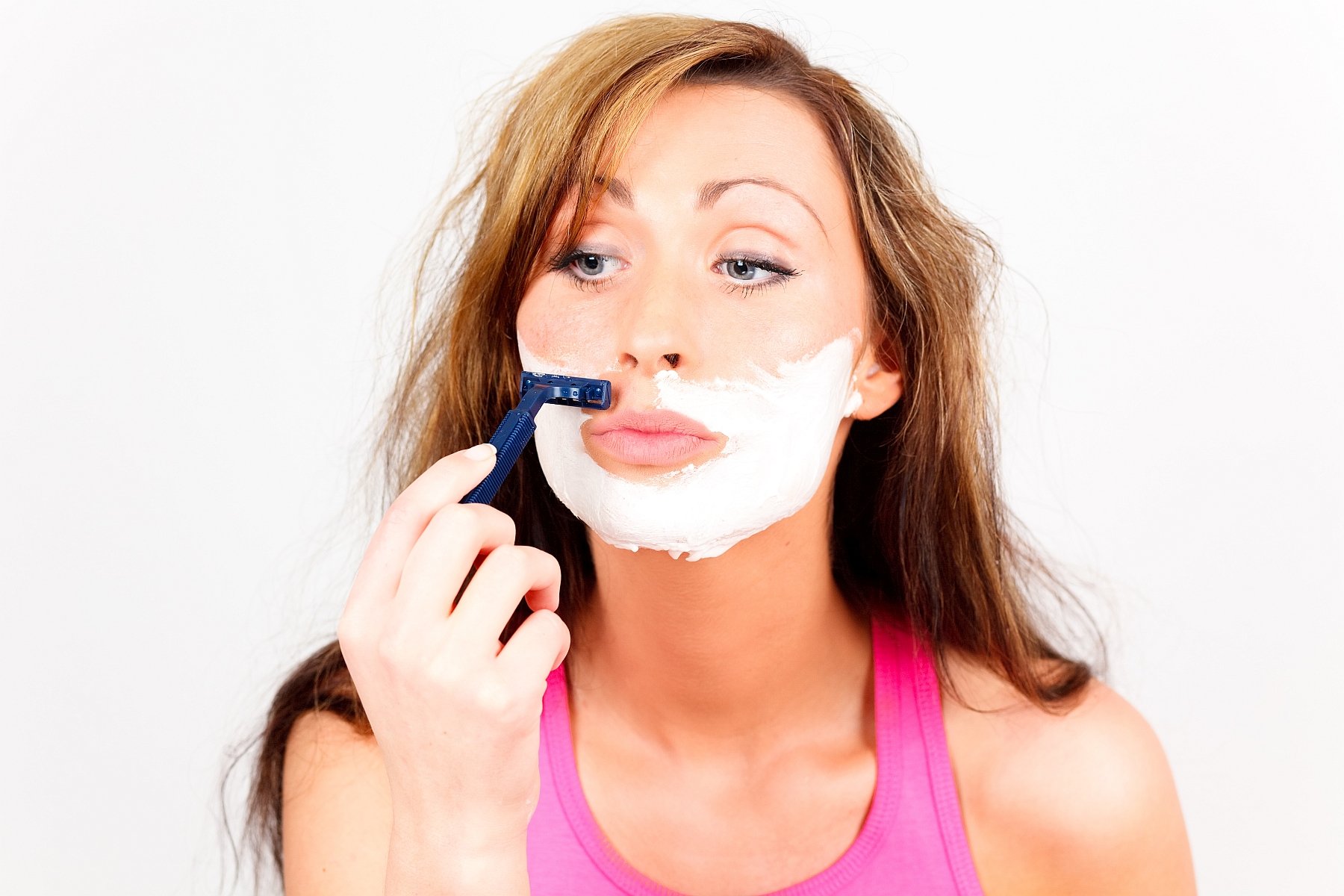 Shaving woman. Женщина бреется. Женщина бреет лицо. Женщина бреет усы.